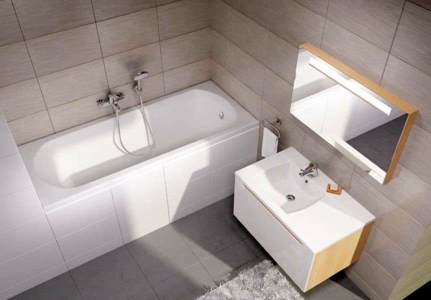 картинка Акриловая ванна Ravak Domino 160x70 с ножками CY00000000 и сливом-переливом X01507 
